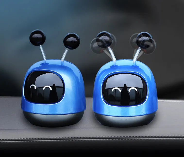Colourful robot-shaped car vent clip aromatherapy diffuser with 40ml gel capacity.