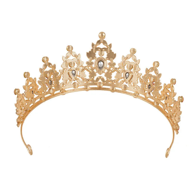 Baroque-style silver alloy bride crown headdress with white rhinestone detailing on a dark background.