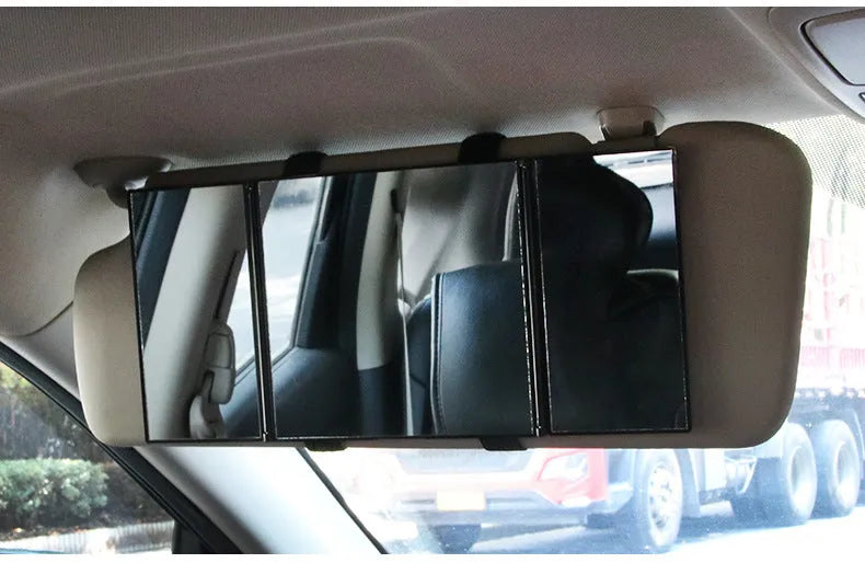 Silver car folding makeup mirror showing closed and open positions