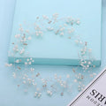 Pearl-decorated wire hair band for weddings in silver, gold, or rose gold on a white background.