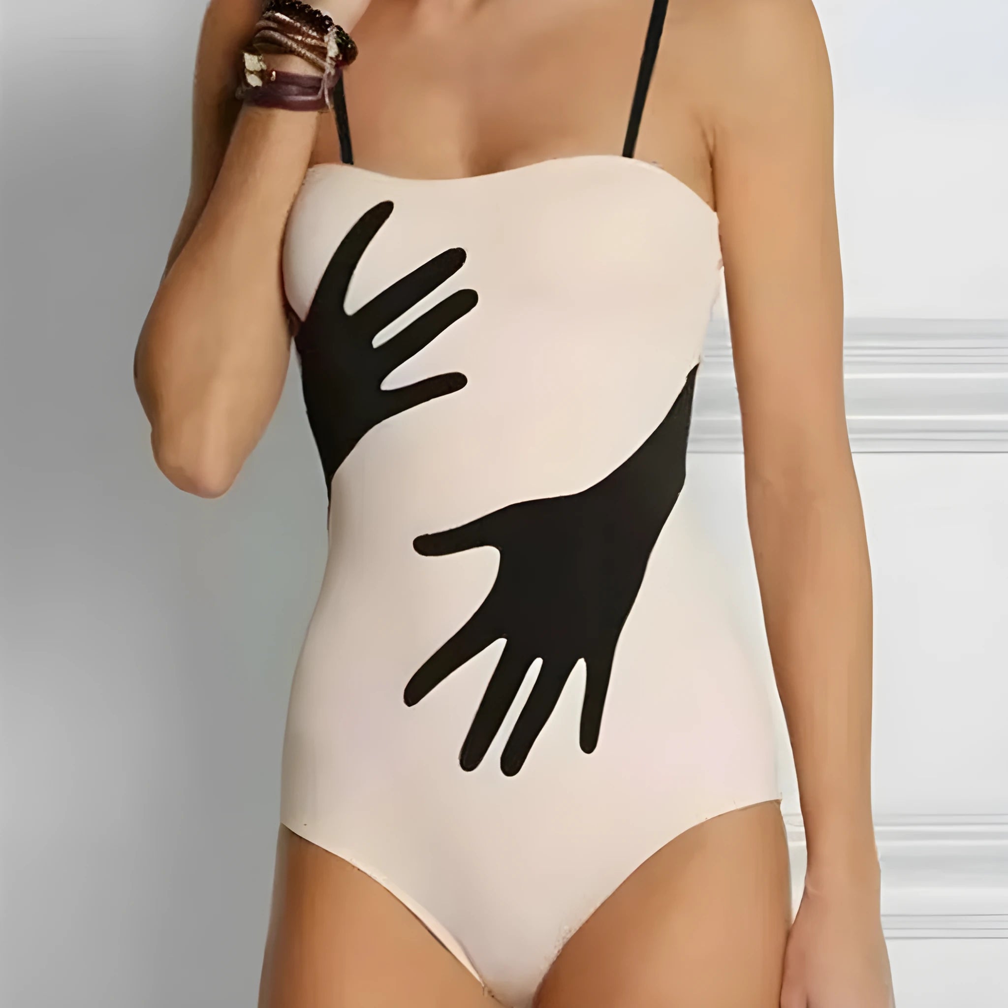 Women's solid colour one-piece bikini swimsuit on a mannequin, with an optional gauze skirt variant.