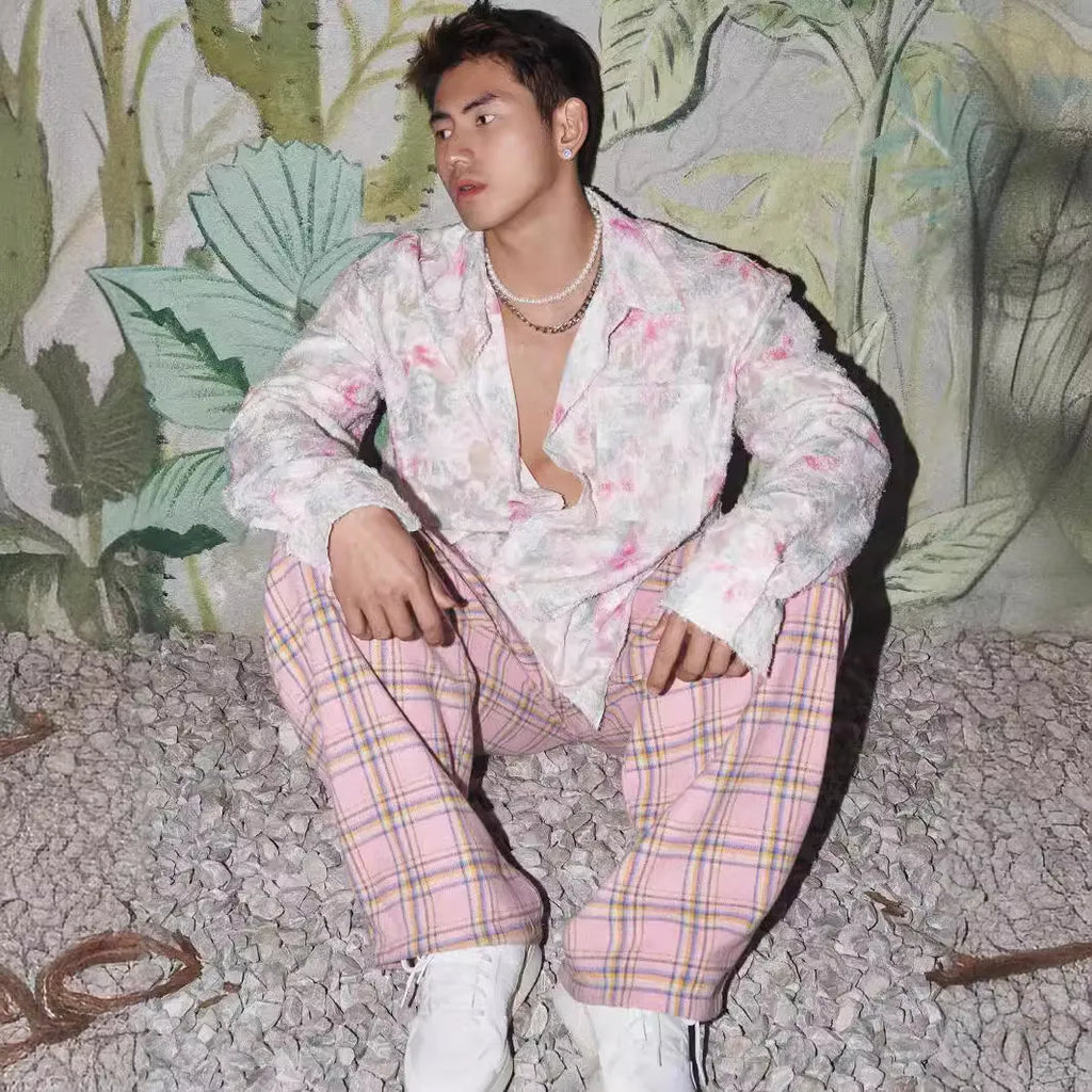 Men's pink floral long sleeve shirt with embossed pattern and loose fit.