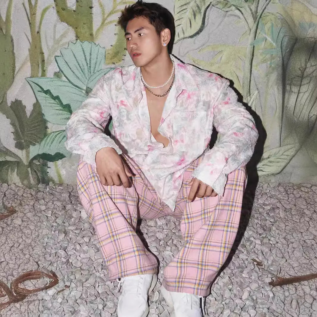 Men's pink floral long sleeve shirt with embossed pattern and loose fit.