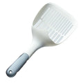 White plastic cat litter scoop with a self-cleaning base on a white background.