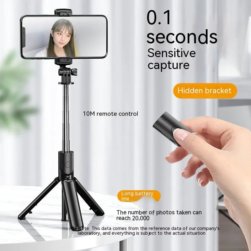 Black selfie stick tripod with wireless Bluetooth remote and universal phone holder, anti-shake floor stand.