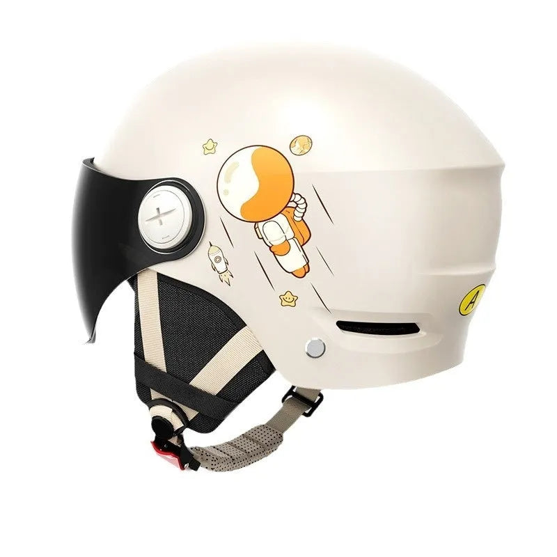 Khaki coloured electric motorcycle half helmet with a long clear visor on a grey background.