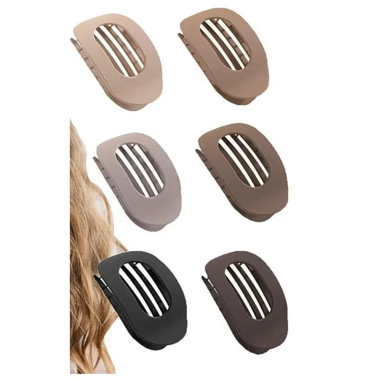 Six nude-coloured plastic hair clips with frosted grip and pointed toe design arranged on white background