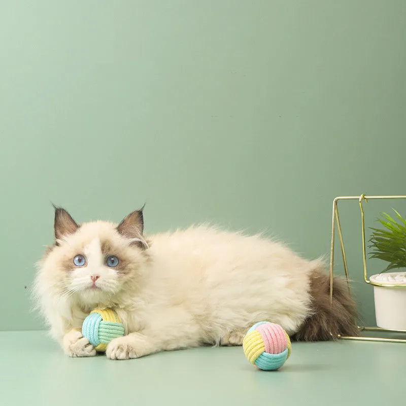 Handmade plush cotton cat hairball toy in blue pink colour for teeth grinding