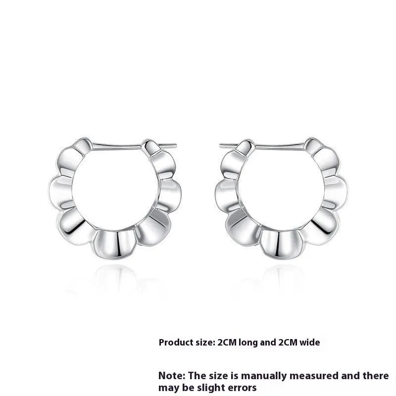 Sterling silver geometric earrings with round retro design elements