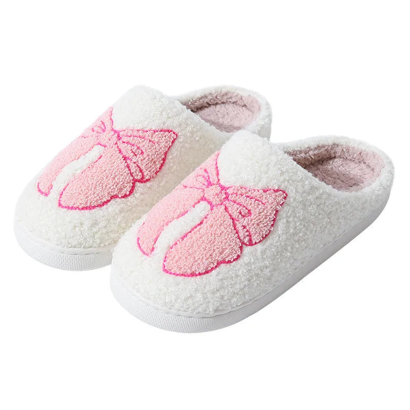 Cartoon bow knot cotton slippers in blue with suede upper and TPR sole.