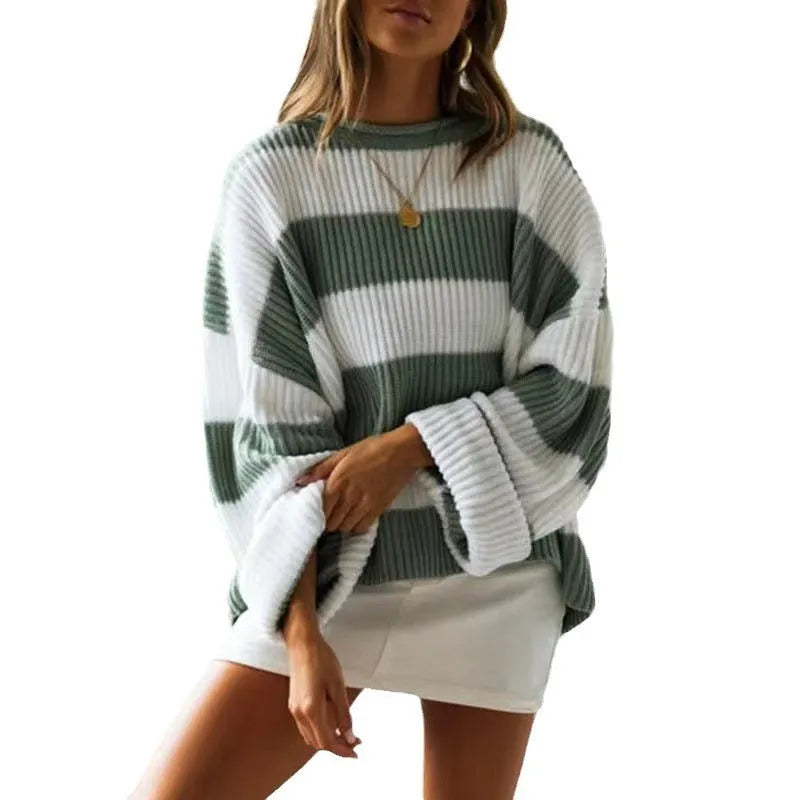 Women's striped loose sweater with bell sleeves and crocheted flower decoration.