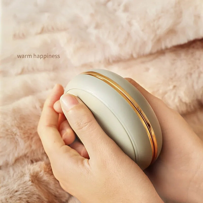 Portable aluminium alloy power bank with hand warmer in coffee colour showing 10000 mAh capacity and Type-C port