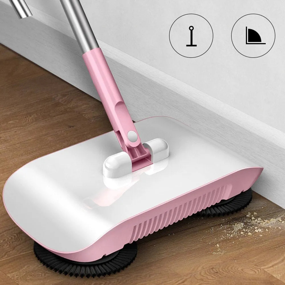 Pink hand push sweeper with rotating brush on floor shows broom dustpan mop all-in-one design