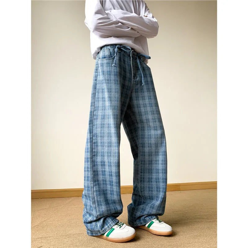 Retro blue plaid wide-leg skinny jeans showing straight-leg cut and zip fly