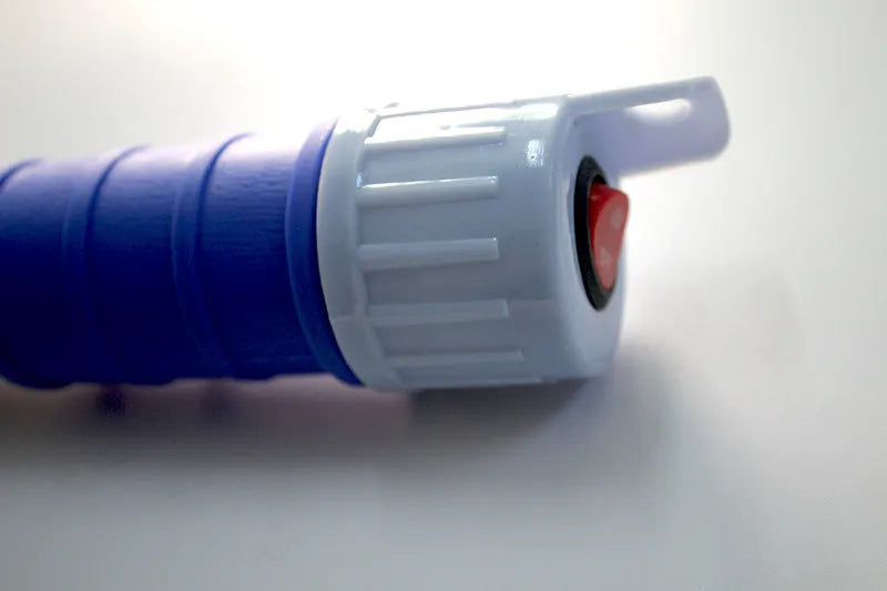 Blue and red manual hand siphon pump for transferring gasoline and liquids.