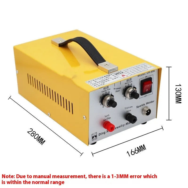 30A DC jewelry spot welder with foot pedal, soldering tweezers, and pedestal on a workbench