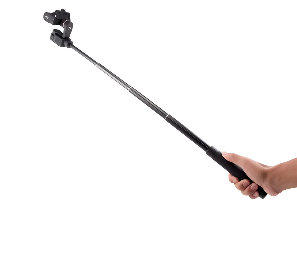 Black retractable aluminium selfie stick extended to 1.2m with a smartphone attached and a Bluetooth remote.