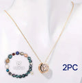 Natural stone beaded necklace and matching bracelet set laid flat, showing polished beads.