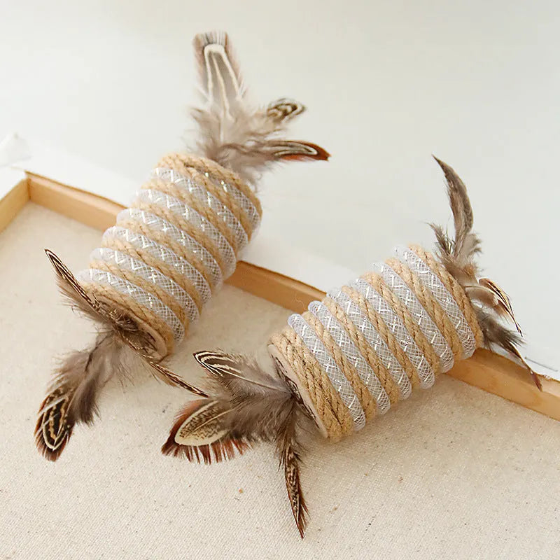 Beige cat toy with hemp rope scratching area, sound-making roller ball, and feather attachments.