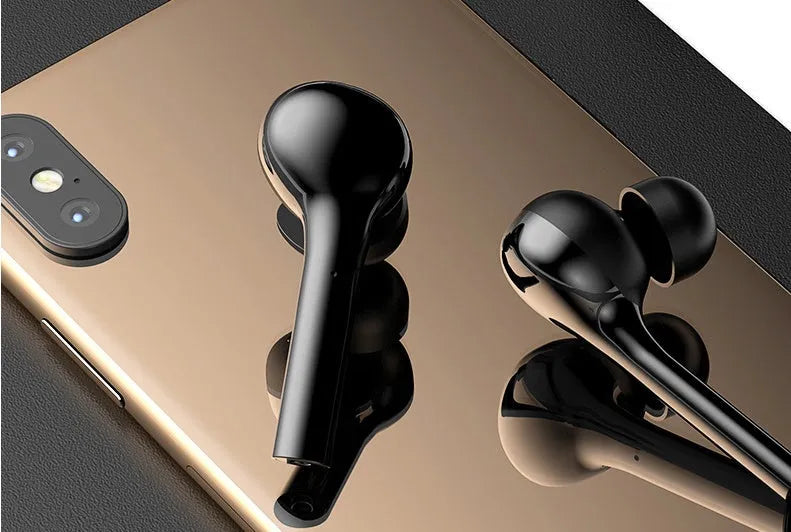 Black and white wireless Bluetooth earbuds with touch controls and charging case