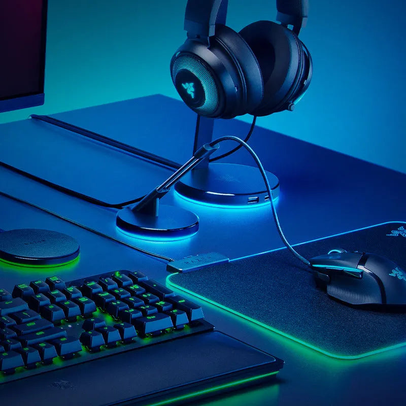 Thunder Snake mouse cable fastener with RGB lighting on a gaming desk