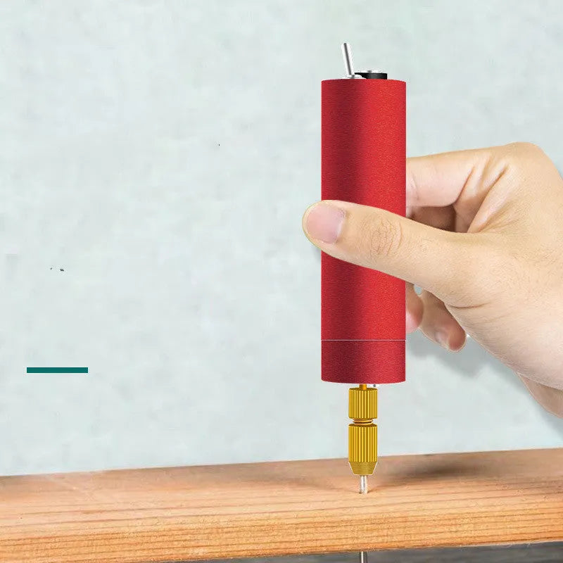 Micro aluminium USB electric grinder with three drill bits on a wooden table