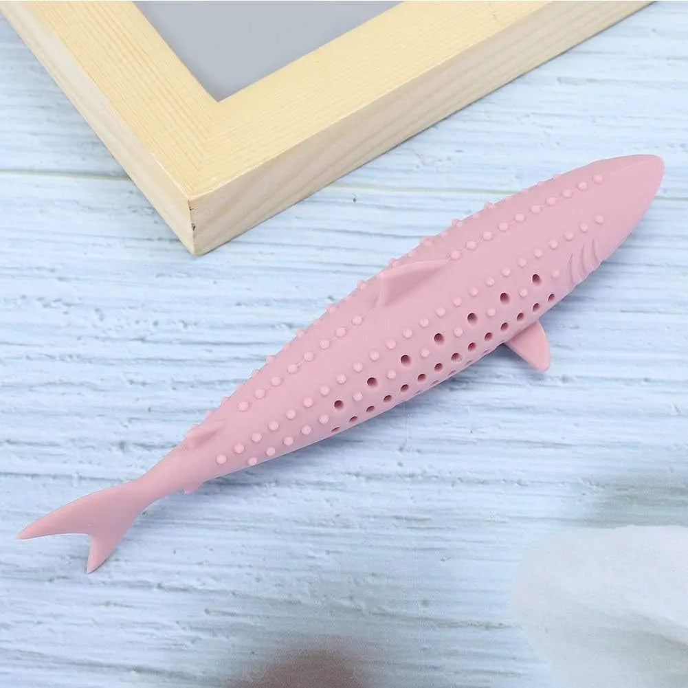 Green fish-shaped silicone cat chew toy with breathable side holes for catnip scent