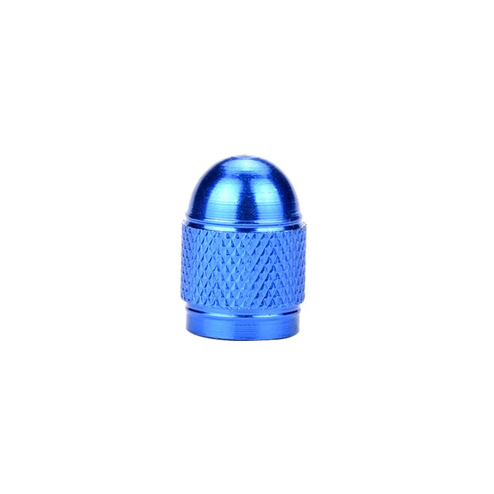 Aluminium mountain bike tyre valve caps in black, blue, gold, red, and silver colours.