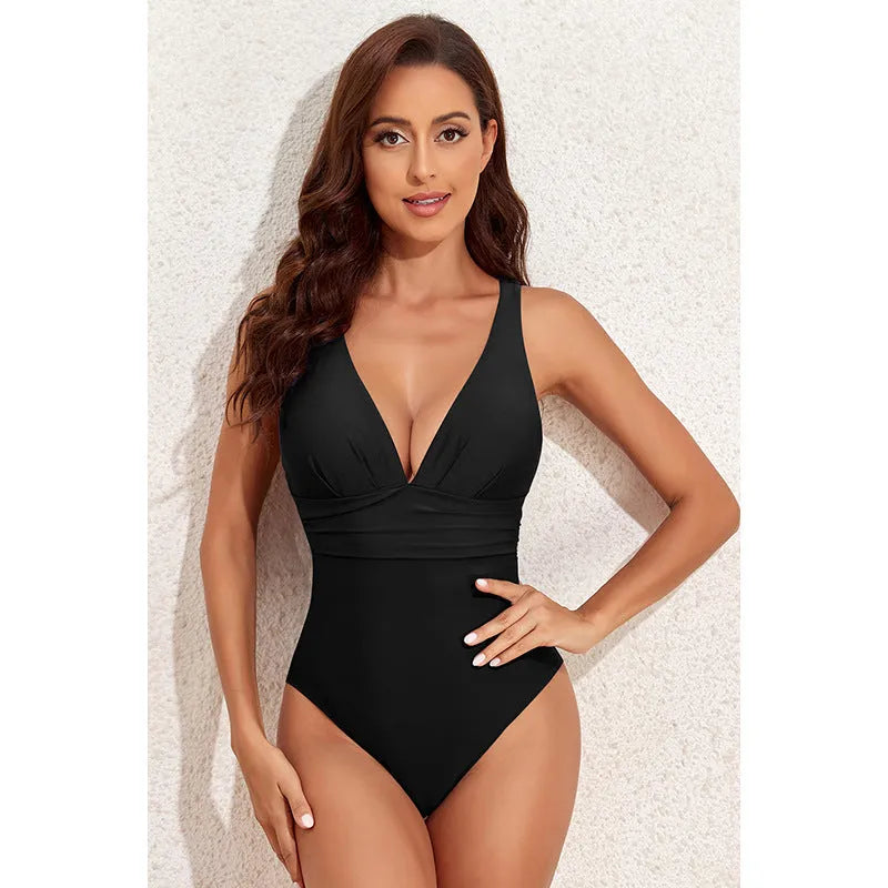 Women's solid colour cross-shoulder one-piece swimsuit on hanger