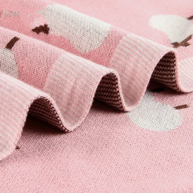 Grey and pink 100x80 cm cotton baby sheepskin blanket laid flat, suitable as a pram or cot cover.