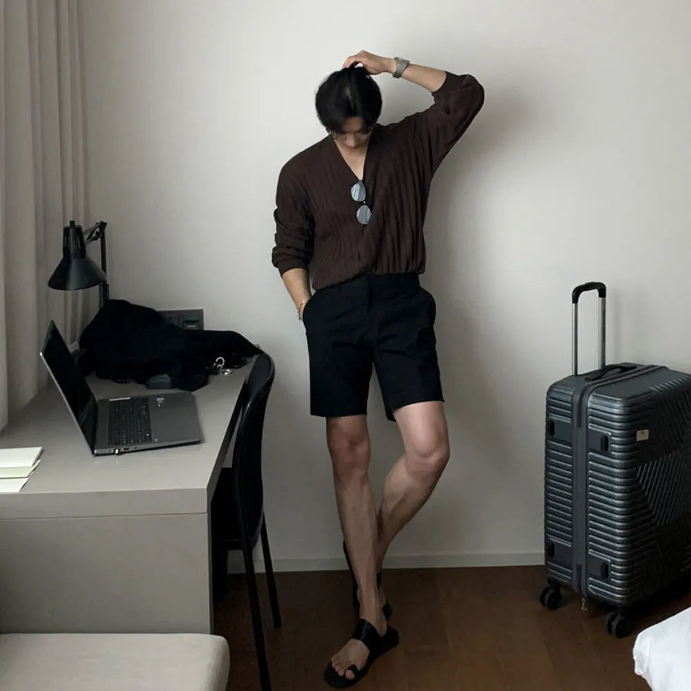 Men's loose straight casual shorts in black, white, and khaki solid colours made from polyester fabric