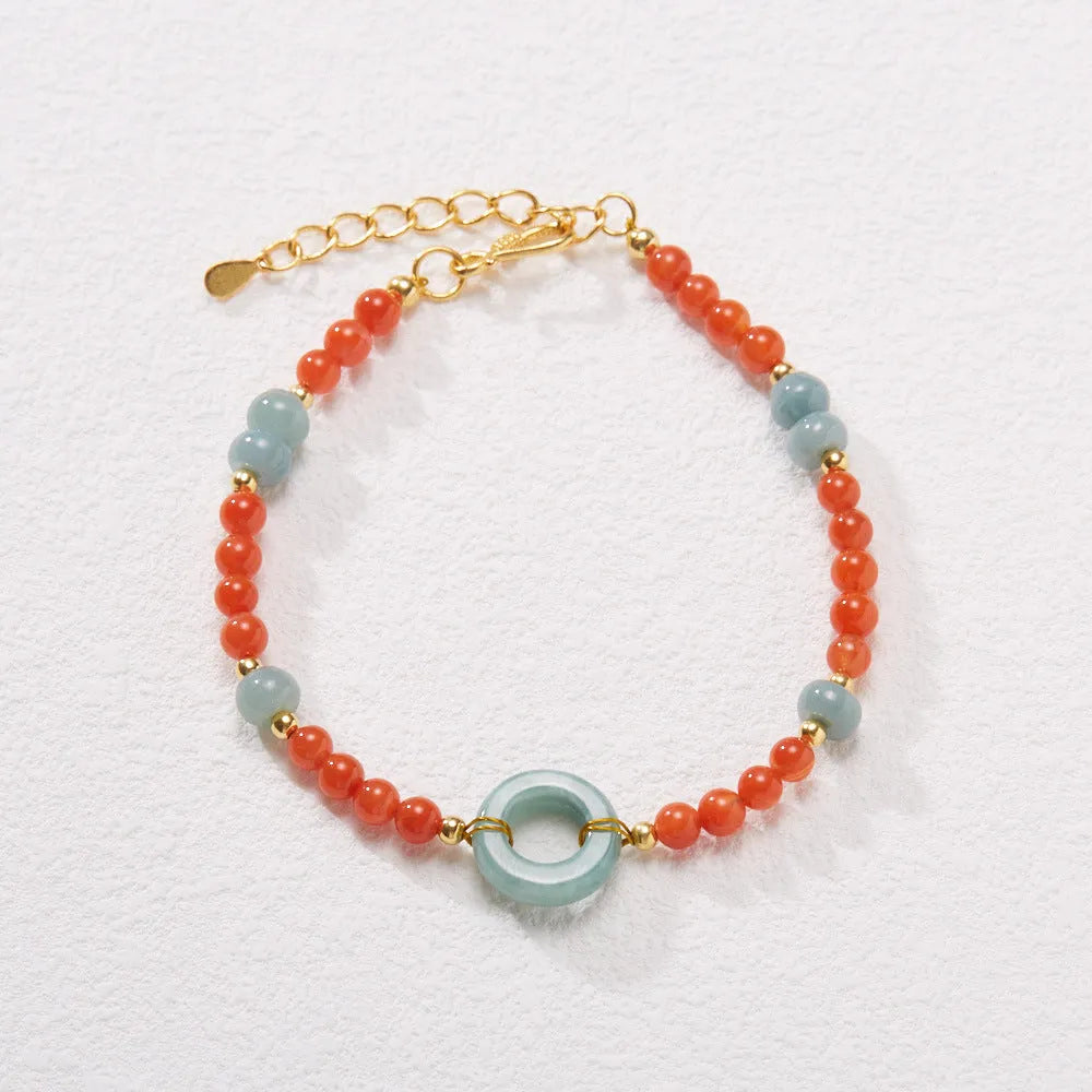 Women's South Red Agate bracelet with geometric patterns and an adjustable safety buckle.