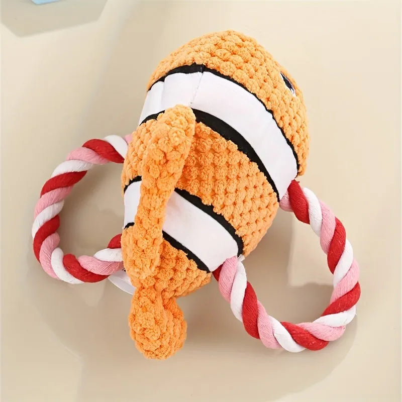 Turtle shaped dog chewing toy in green colour showing plush fabric and rope knot construction