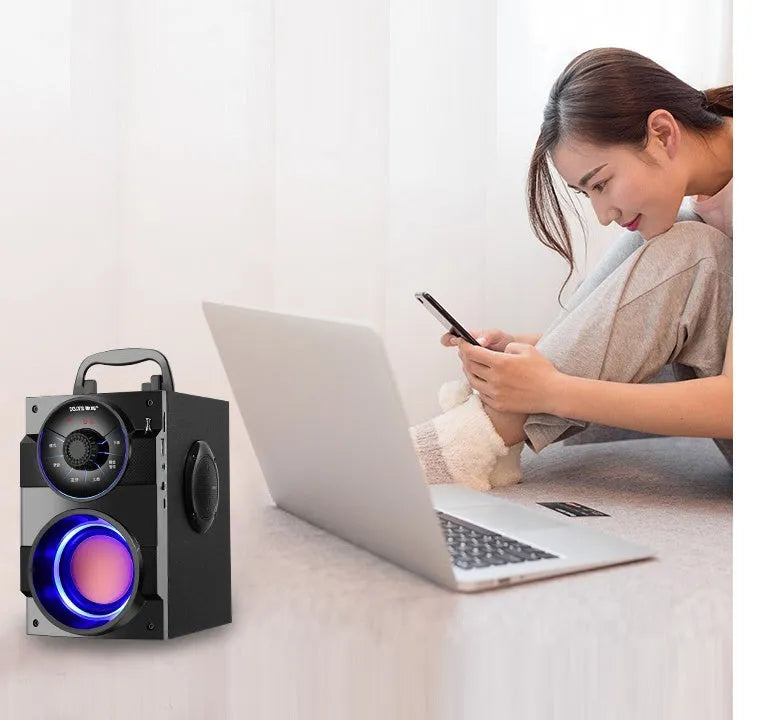 Black mini portable home audio speaker system with subwoofer and connection cable