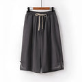 Wide leg cotton summer shorts in apricot colour with embroidery detail on a mid waist.