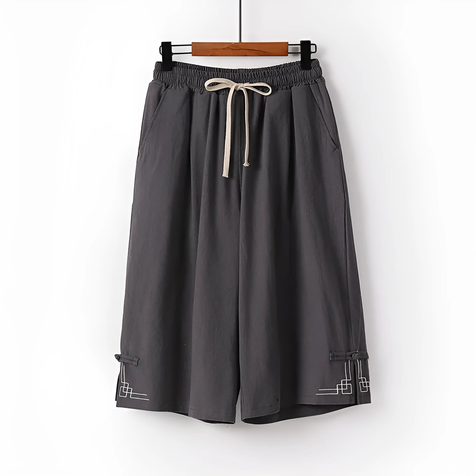 Wide leg cotton summer shorts in apricot colour with embroidery detail on a mid waist.