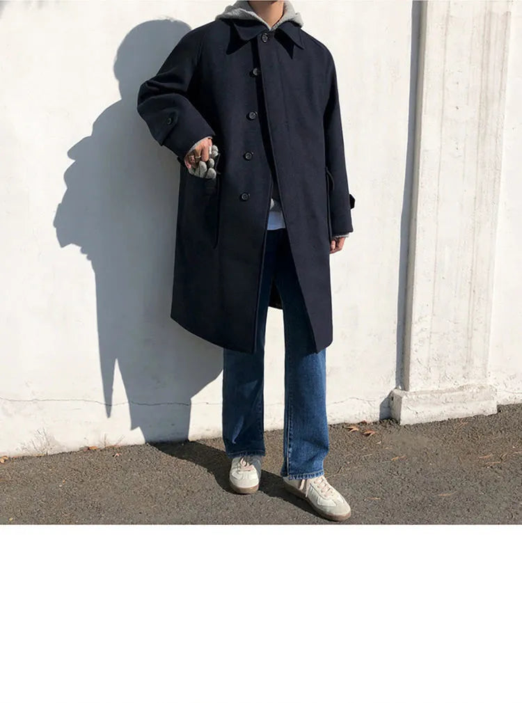 Plus size women wearing a British style blue wool look trench coat with slim fit