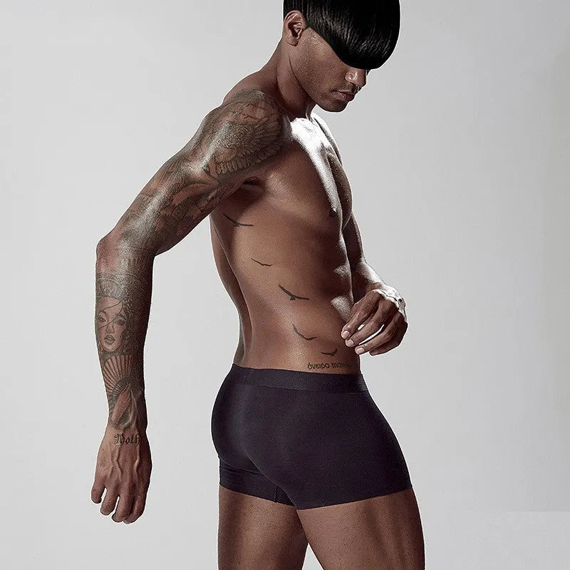 Men's seamless modal underwear in white, pink, green colours showing mid waist fit