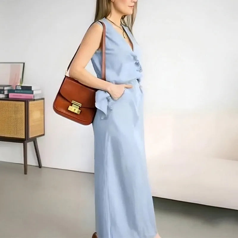 Women's sleeveless vest and long skirt two-piece suit in blue, white, or yellow polyester fabric