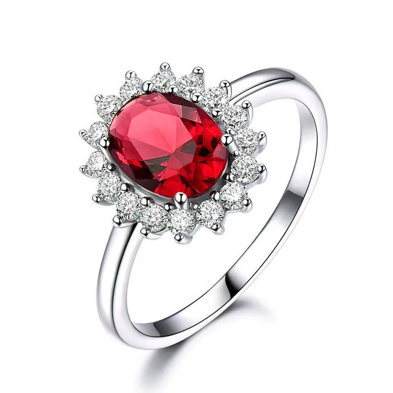 Women's floral copper ring with a blue moissanite centre stone on a model's finger.