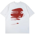 White loose-fit short-sleeve cotton t-shirt on a hanger, showing round neck and straight cut.