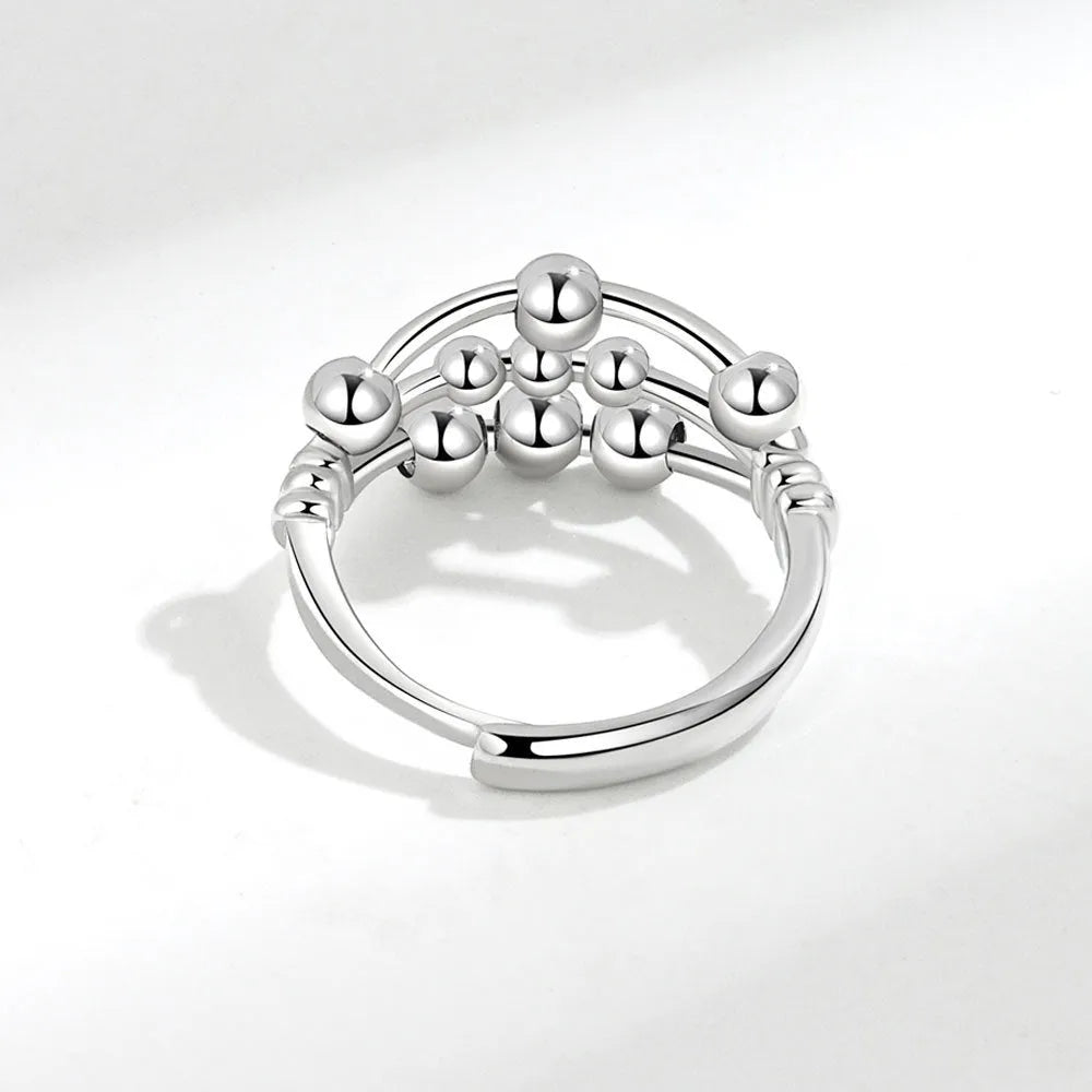 Adjustable open ring in white gold colour with three-layer beaded geometric design and copper electroplated finish
