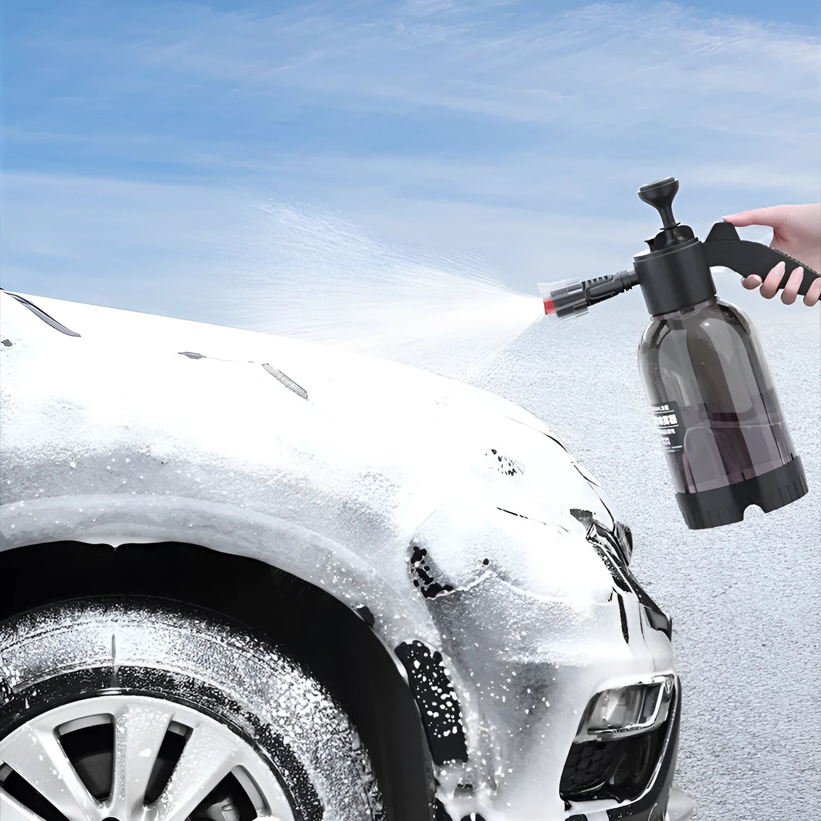 Black handheld 2L foam watering can sprayer with pump handle and two nozzles.