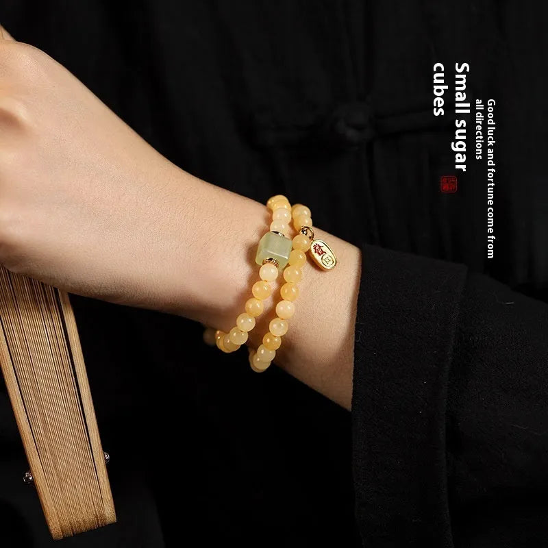 Hand-woven women's topaz bracelet with 6mm mantra barrel beads and square sugar jade pieces