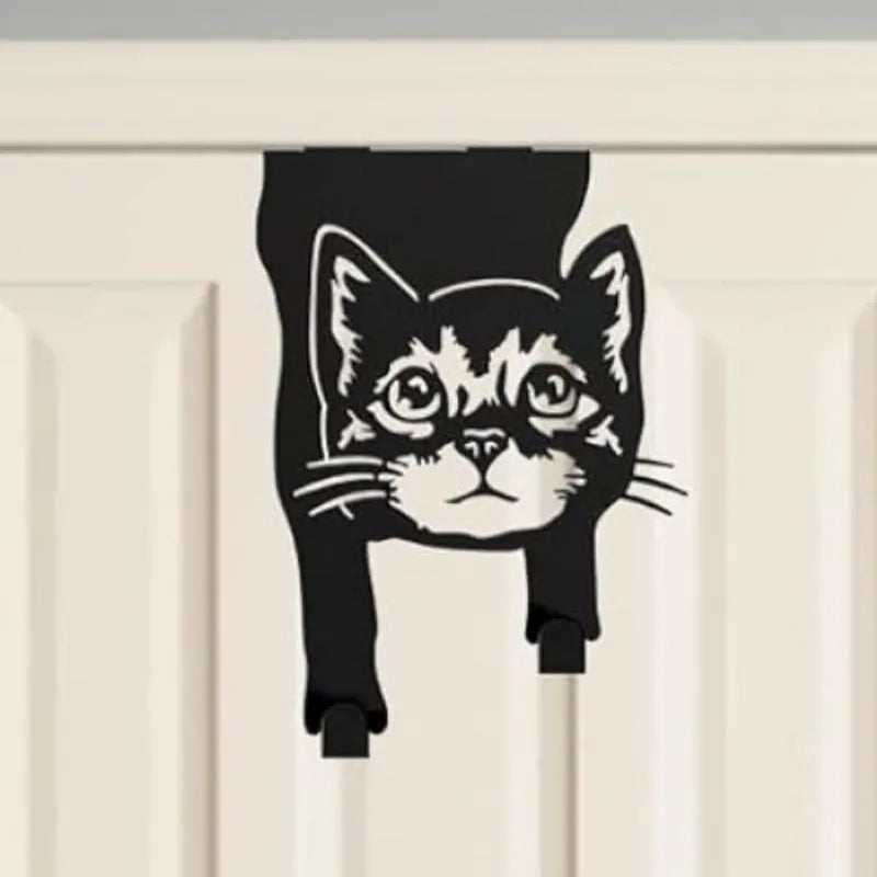 Black iron wall-mounted cat hook with modern design for punch-free installation.