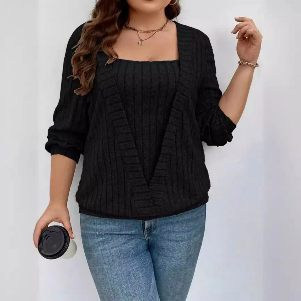 Women's loose fit ribbed false two-piece suit with V-neck and long sleeves in solid colour.
