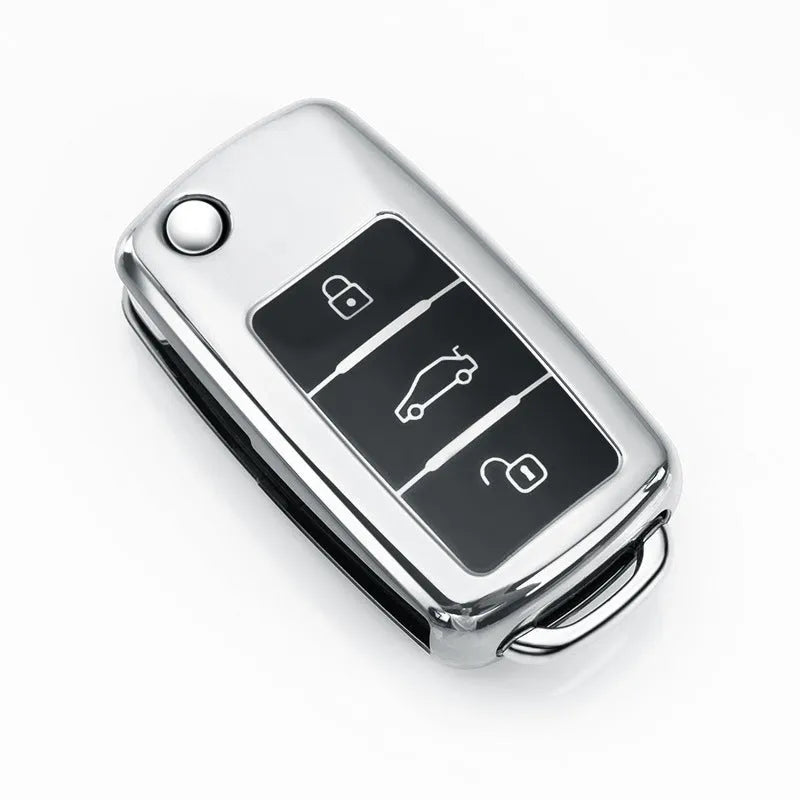 VW Model A folding key case in TPU material shown in blue, pink, red, and silver colours.