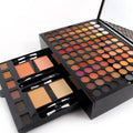 Piano-shaped makeup palette box containing 180 eyeshadow colours with powder, blush and contour cosmetics