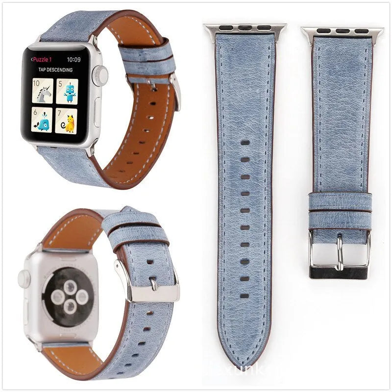 Blue leather watch strap with a silver folding buckle on a 42mm width setting.