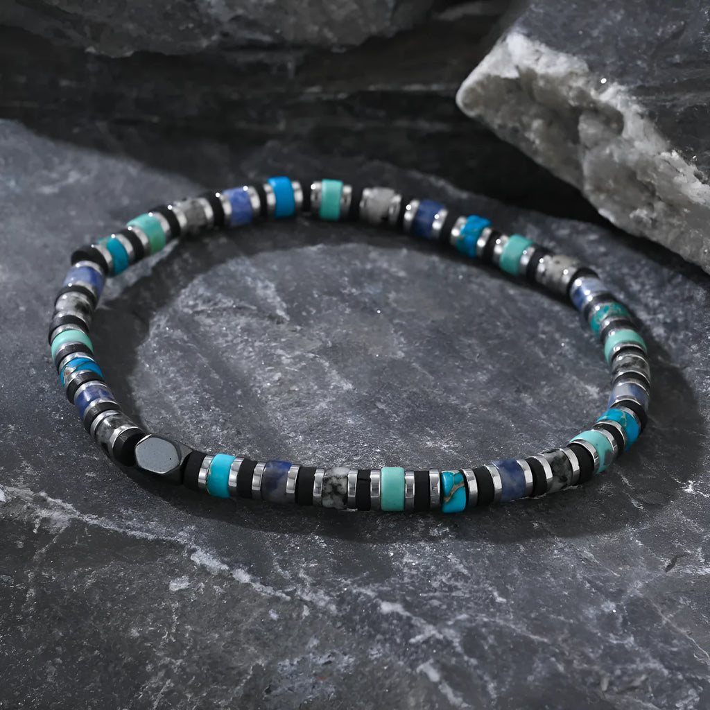 Bohemian cylindrical bracelet with hand-woven semi-precious stones in geometric design